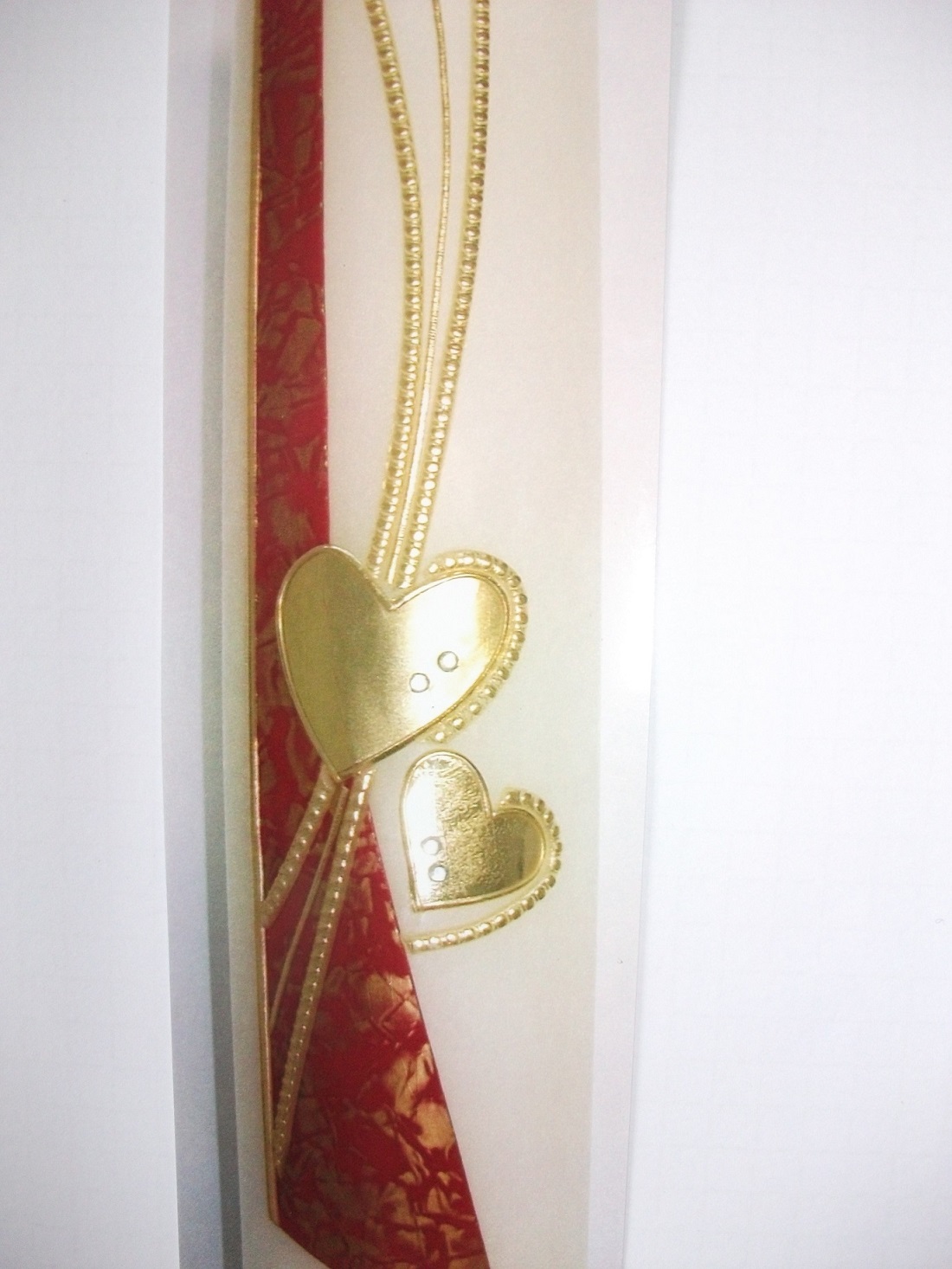 Hochzeitskerze rot marmoriert mit goldenen Herzen